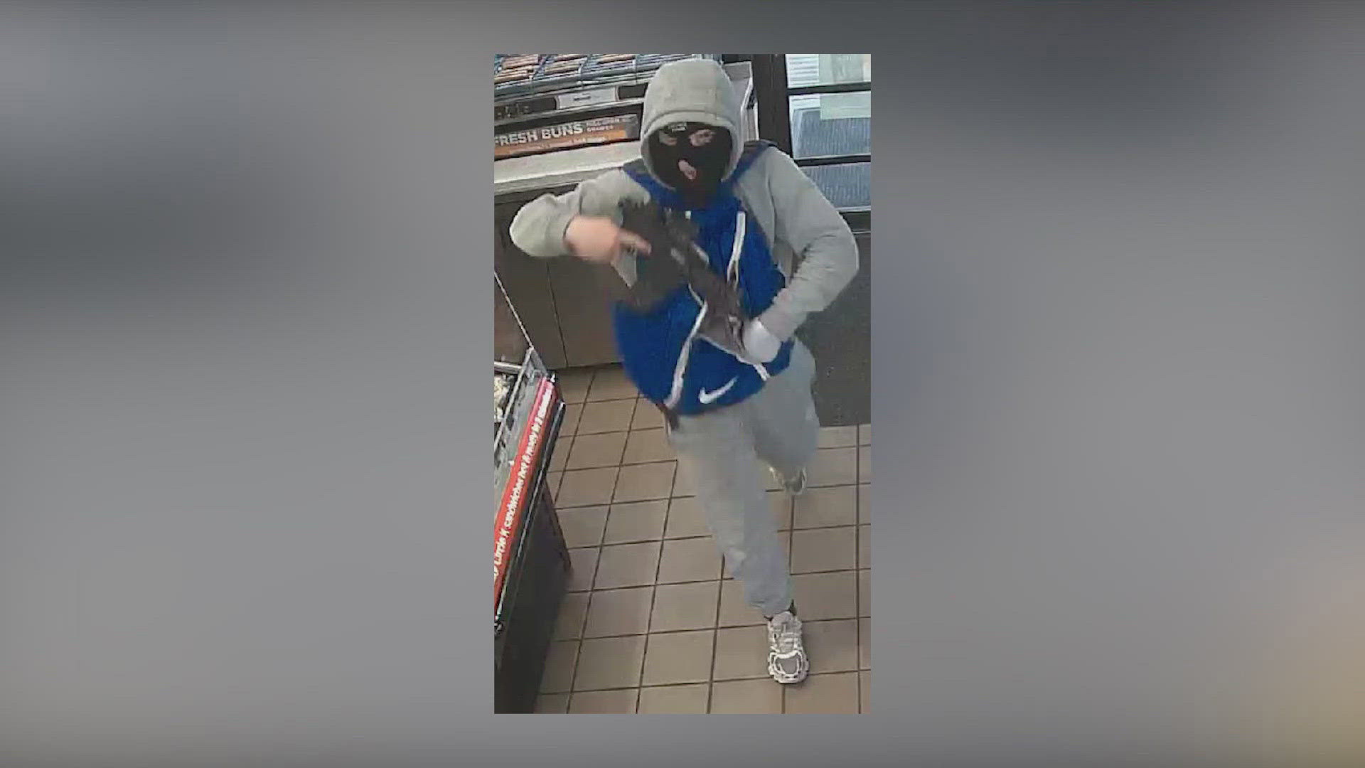Police searching for man who robbed gas staion cashier at gunpoint