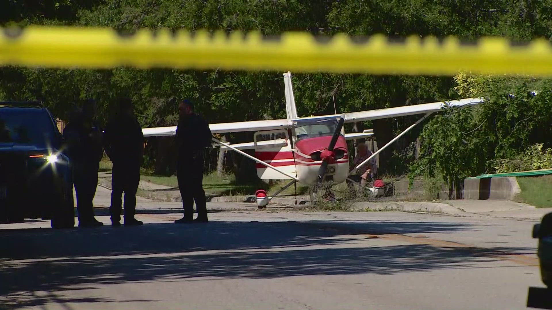 A KENS 5 viewer sent video of the small plane on the side of the road.