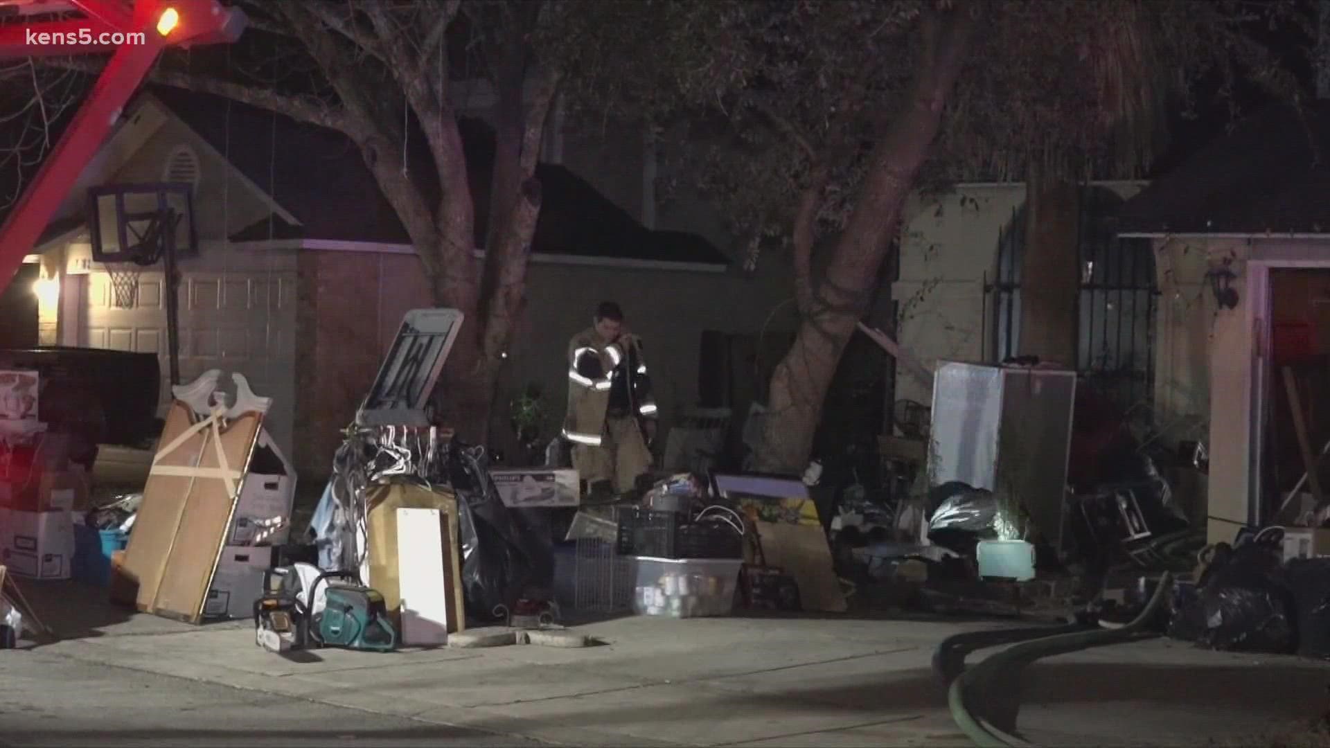 Authorities had a difficult time getting to the flames because there were a lot of items in and outside the home blocking the entrance.