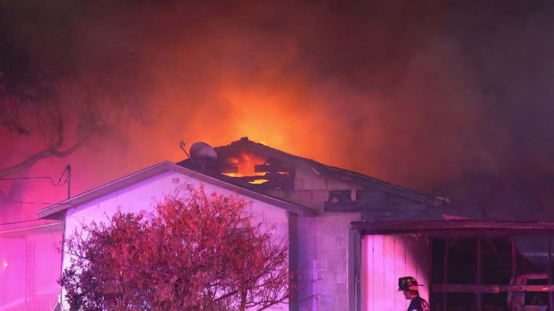 Officials say there were some guns and ammunition inside the home which made loud, popping sounds when the flames reached them.