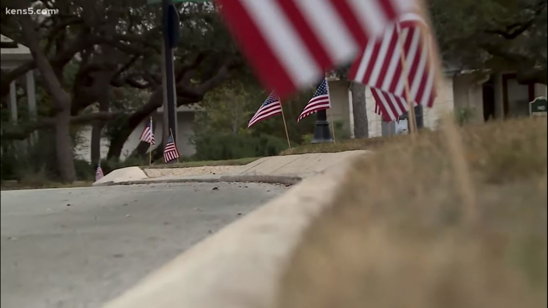 A San Antonio neighborhood's Veterans Day tradition of planting hundreds of U.S. flags takes on new meaning in 2020.