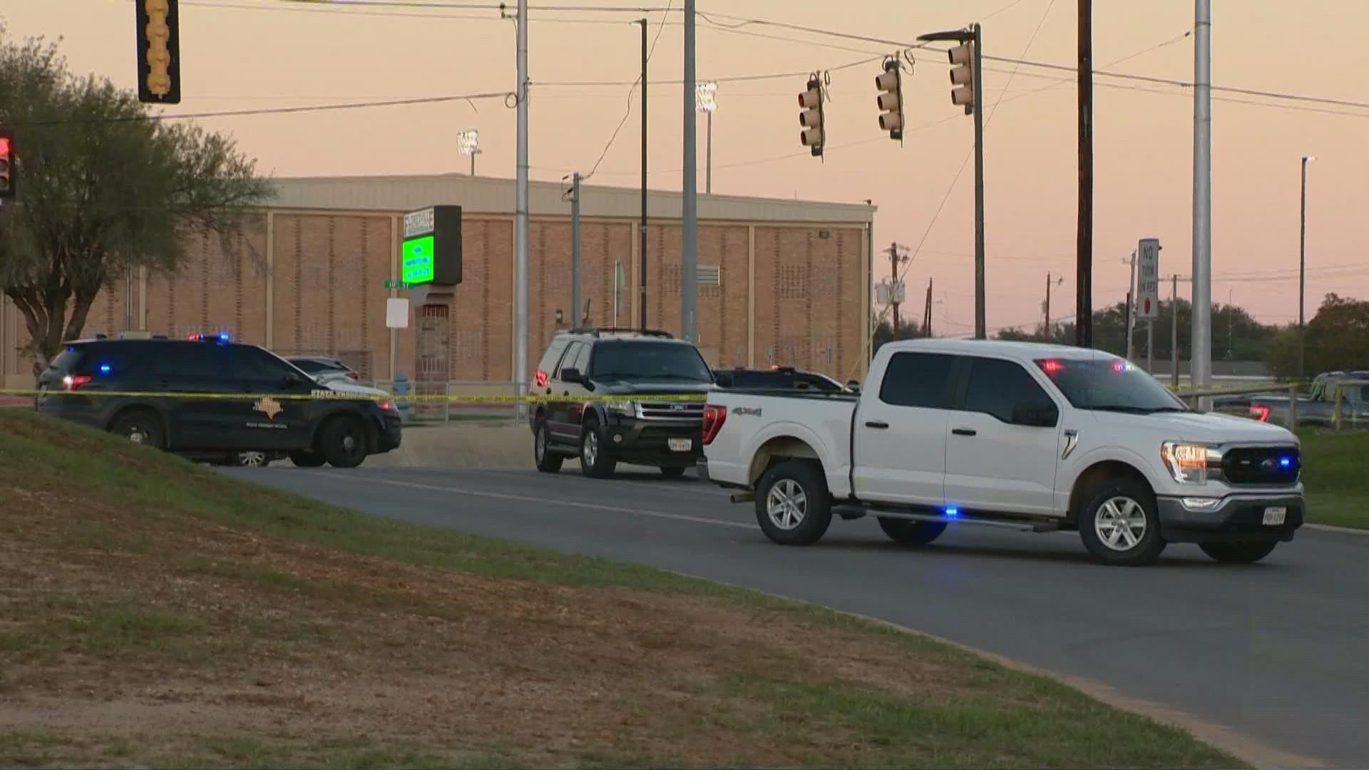 Dozens of officers responded to the shooting scene, but authorities say only the suspect was hit. Floresville High School was briefly on lockdown.