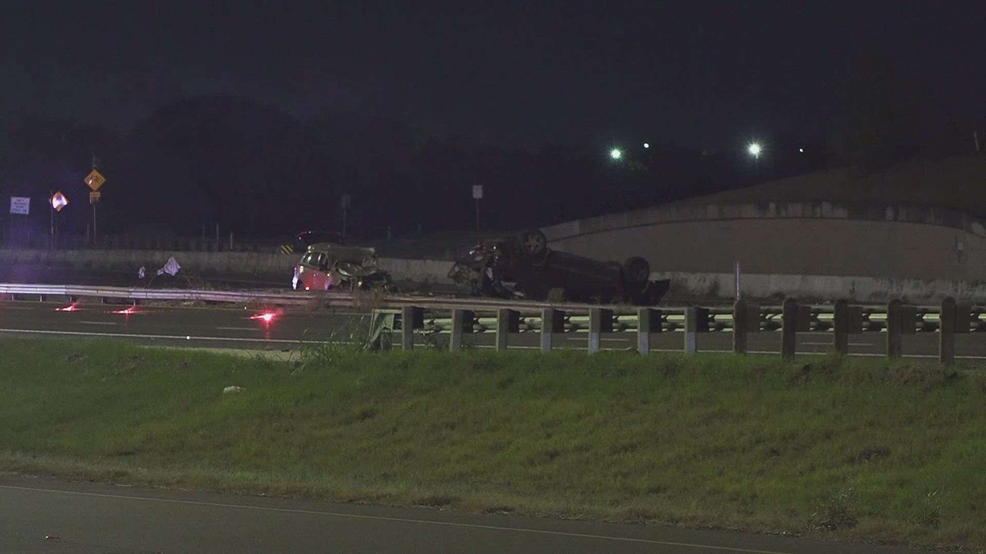 Police say a vehicle rolled over on the main lanes and another vehicle was not able to stop in time and slammed into the rolled car.