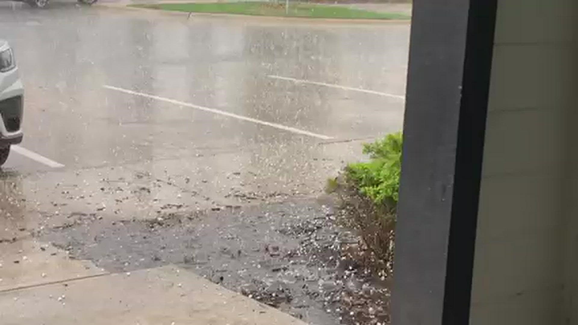 KENS 5 Photojournalist Mike Vigil captured video of small hail coming down in the Alamo City as storms move through town.