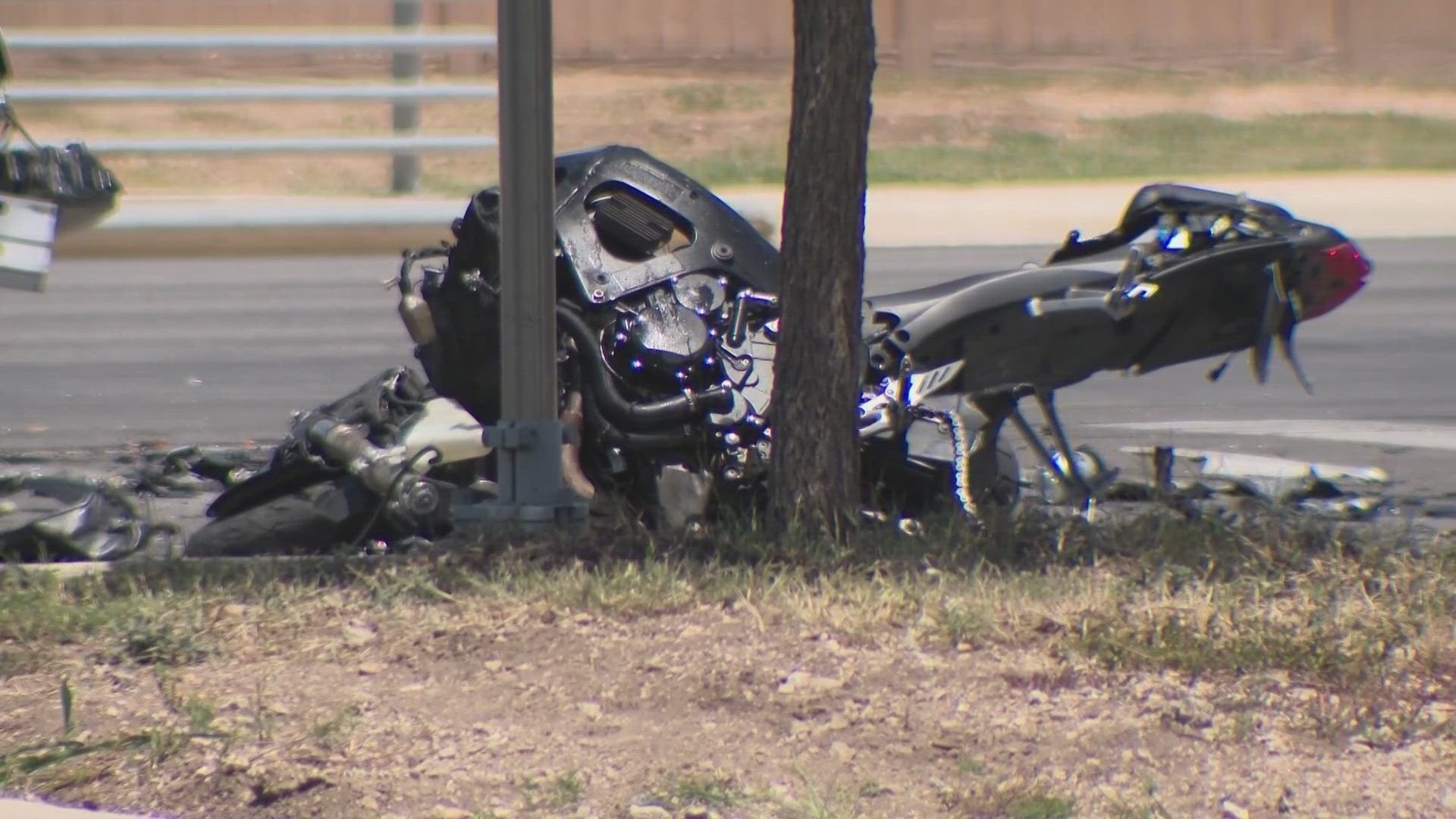 Police said the 23-year-old motorcyclist was "traveling at a high rate of speed" and weaving between vehicles when it crashed into the SUV as it was turning.