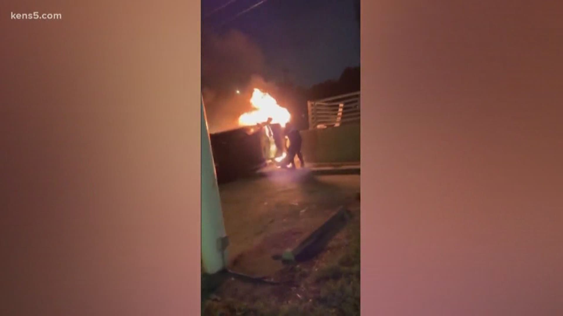 An off-duty St. Mary's University police officer pulled a woman from her car moments before it became completely engulfed in flames. A witness at the scene shared captivating video of the heroic save.