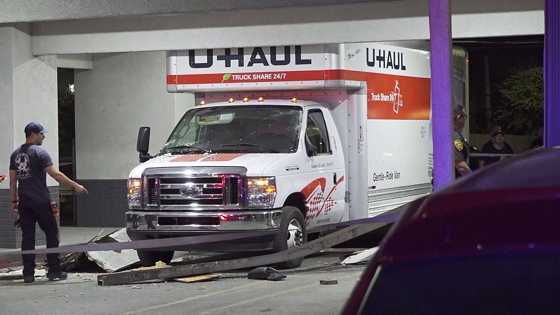 The moving truck was too tall, according to authorities, causing it to hit the carport and get stuck. No injuries were reported.