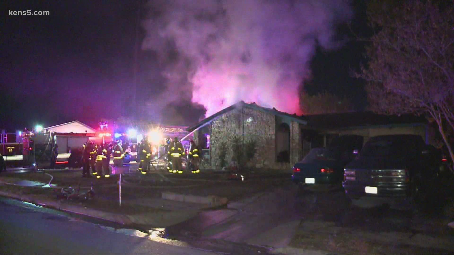 A family escaped with their three dogs from a house fire on the west side, the San Antonio Fire Department said.