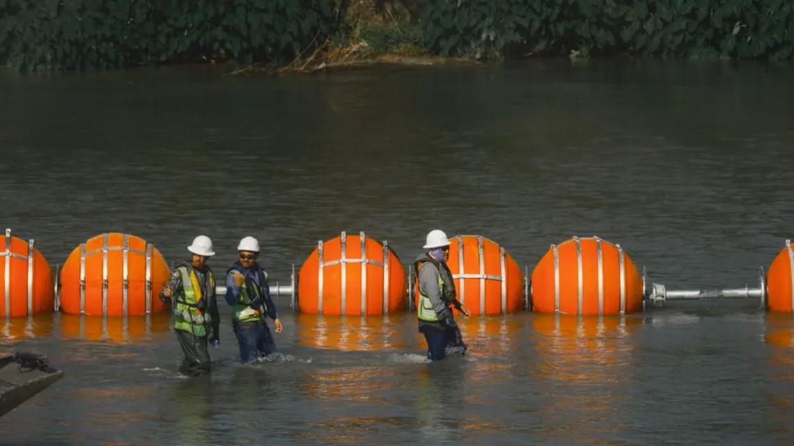 DOJ threatens to sue Texas over floating barriers in Rio Grande | kens5.com