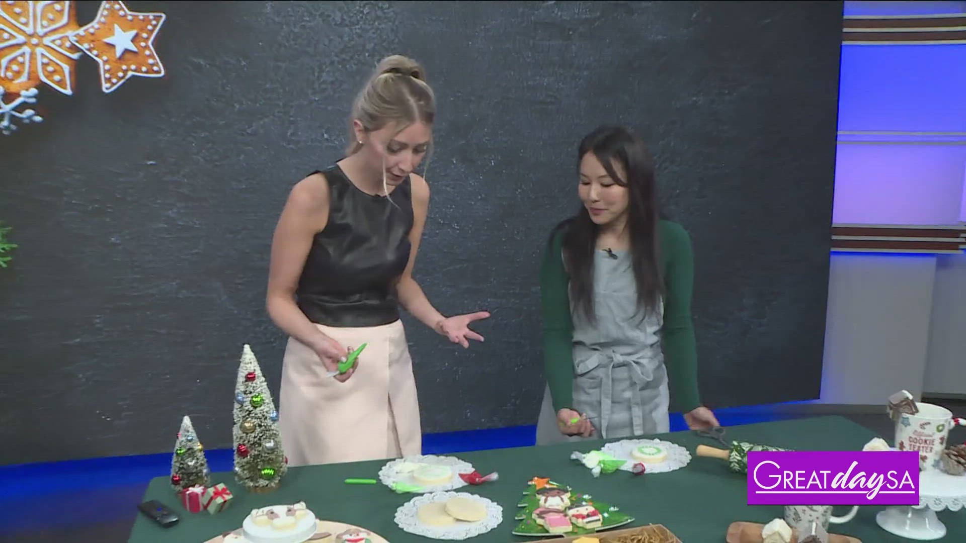 GDSA Producer Christen Urban helps design holiday sugar cookies with Sonomi's Custom Sweets. 