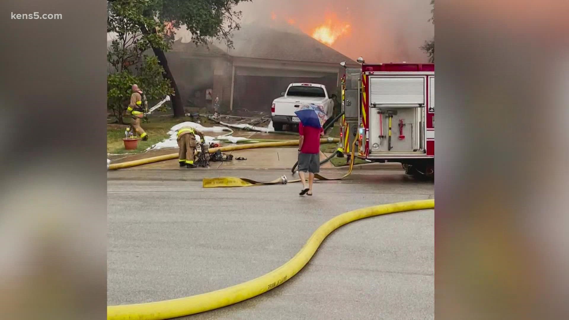 San Antonio Fire Department officials said a lightning strike caused the fire at the home off Bercy Court.