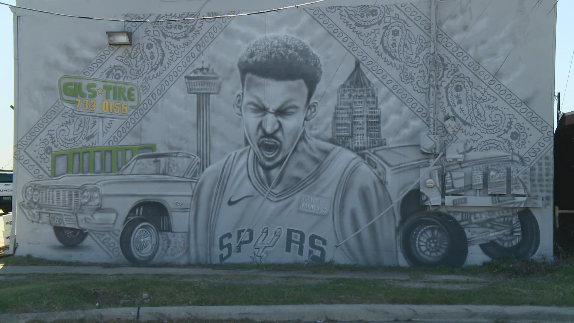 You can see the mural at Gil's Tire Shop off San Pedro near Jackson Keller.