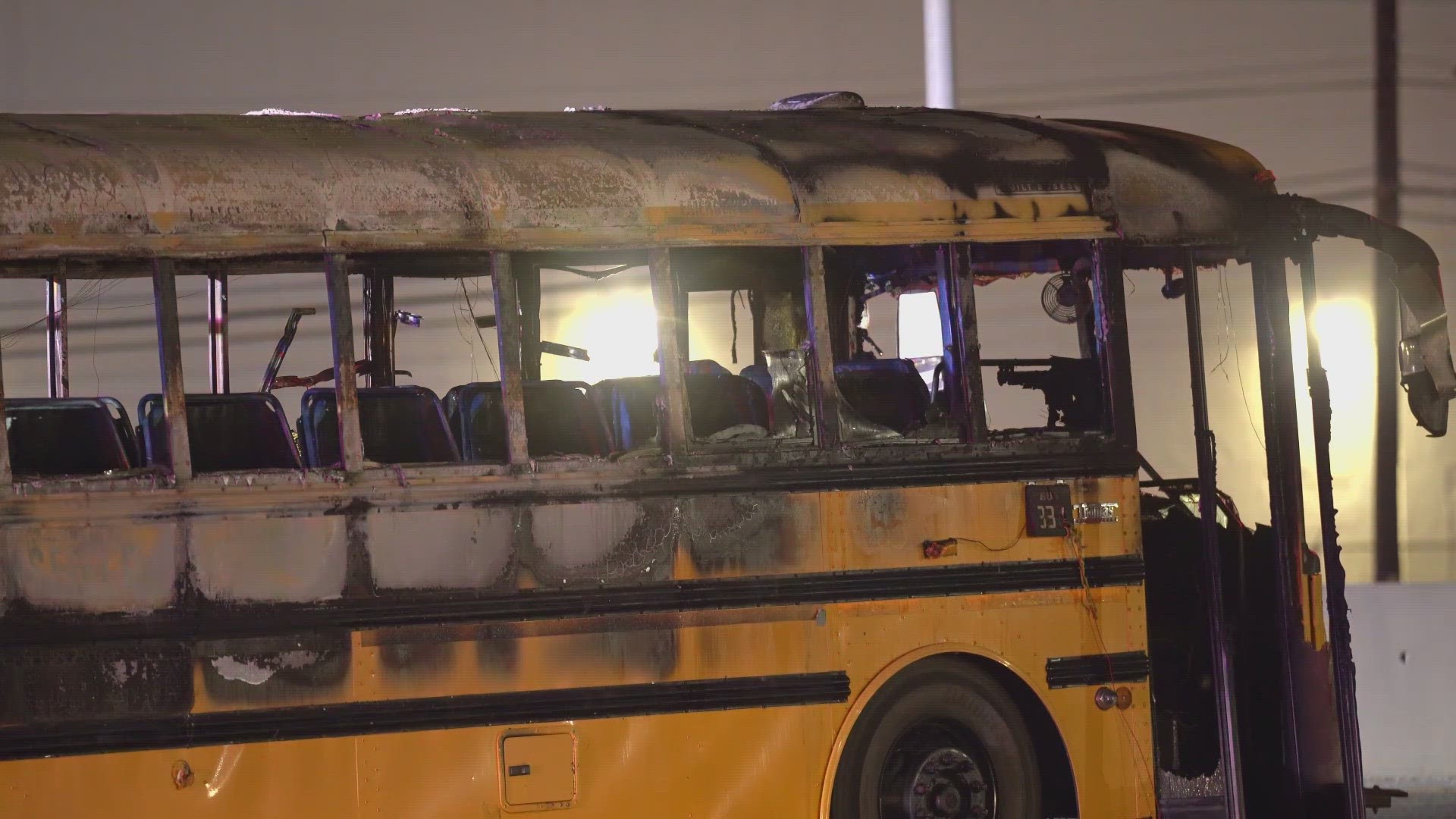 Police say a man purchased two school buses at a San Antonio auction and was in the process of transporting them when he noticed one of the buses on fire.