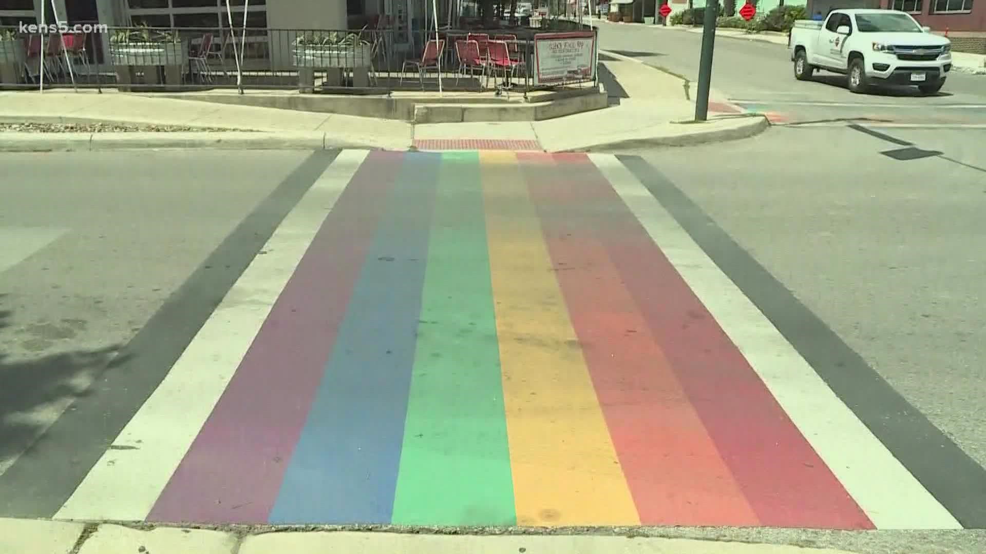 Crews will be reinstalling the rainbow crosswalk in a neighborhood north of downtown Monday.