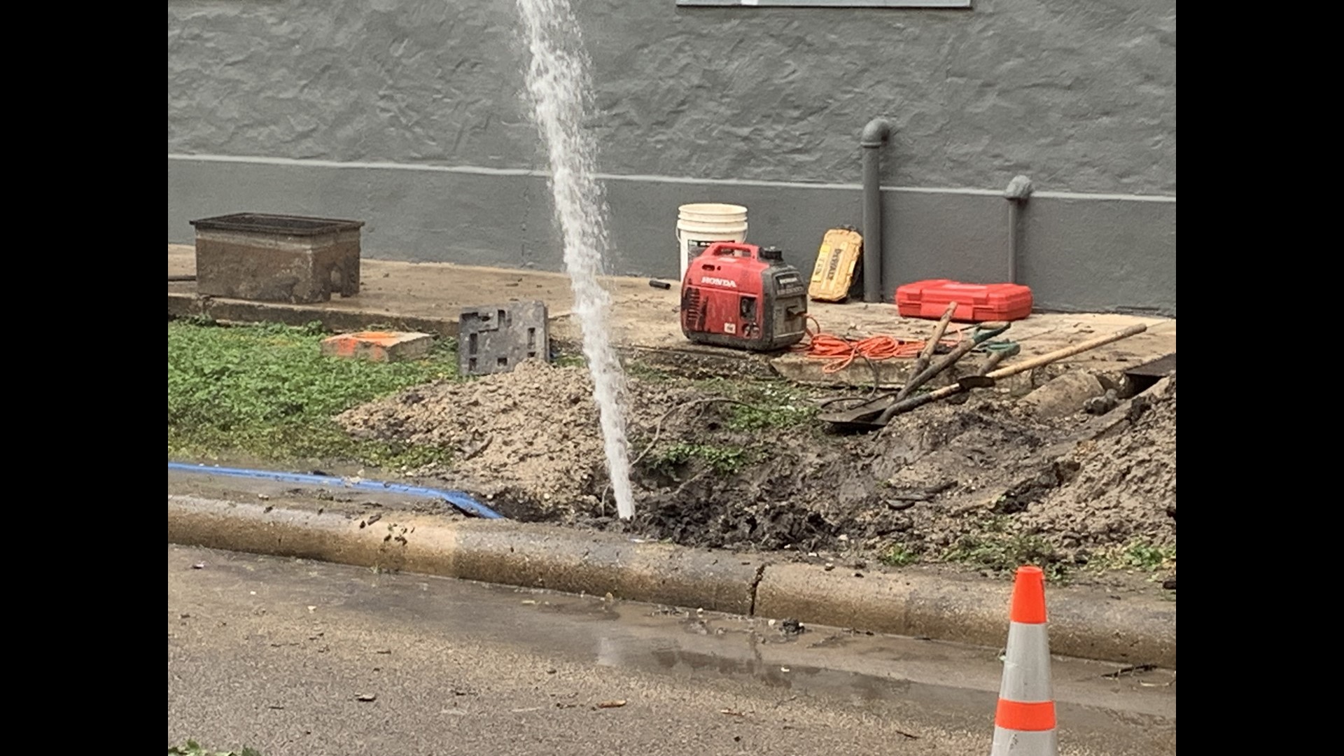 Water main break causes water to shoot 30 feet in the air outside ...