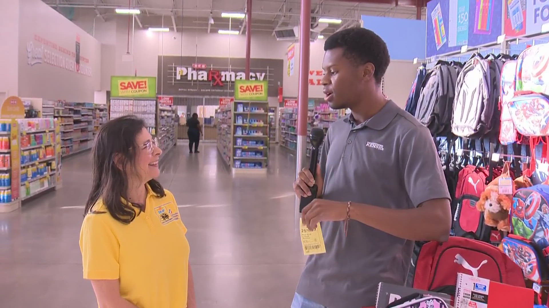 Earl Stoudemire talks with H-E-B officials about what supplies are needed.