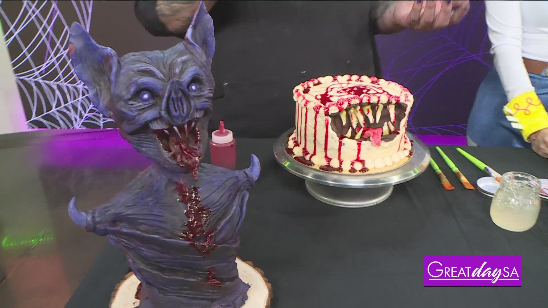 Roma helps make a scary cake by Justin Cakes. 