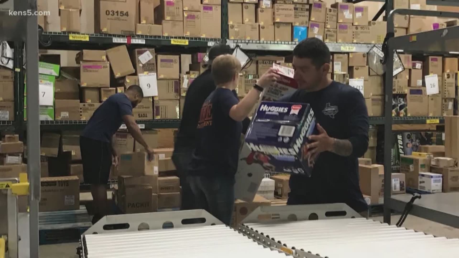 On their day off, firefighters stopped by Walmart to help employees unload 18-wheelers and restock shelves.