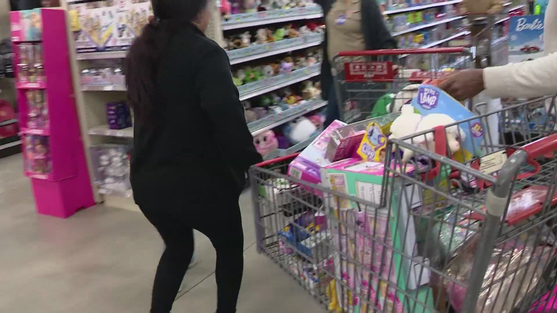 Children from 12 different organizations pushed a cart through the toy aisle at several participating stores and gathered as many toys as possible.