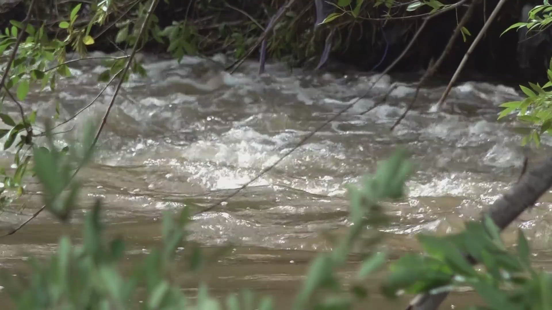 San Antonio police said they found the bodies of two people Monday in floodwaters from heavy rainfall Sunday night.