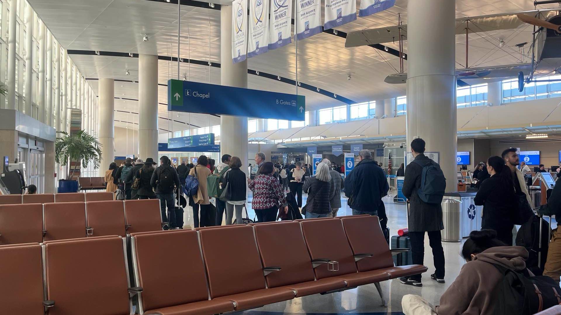 Airport officials did not explain what caused the alarm leading to the evacuation of Terminal B.