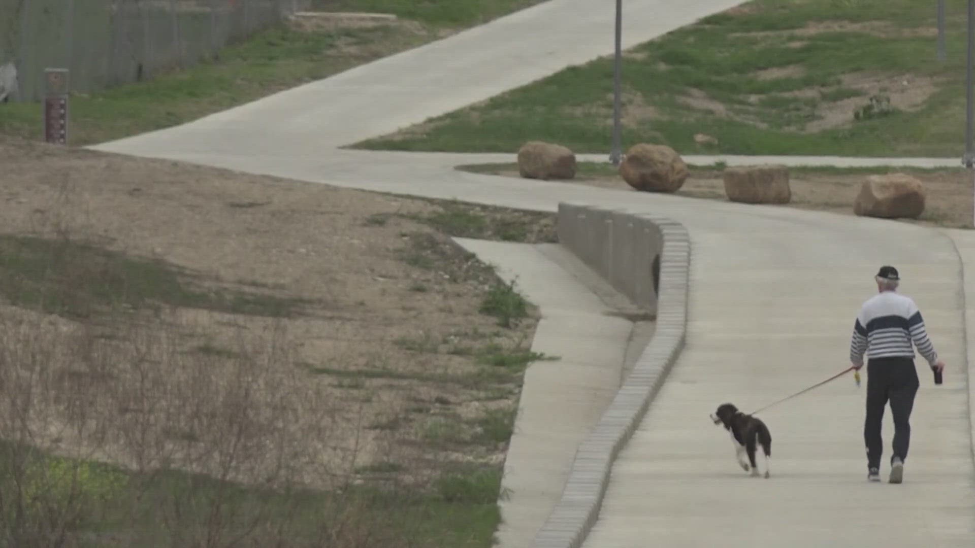 A couple was walking along a greenway trail when two makes men jumped them, eventually shooting and killing a man.