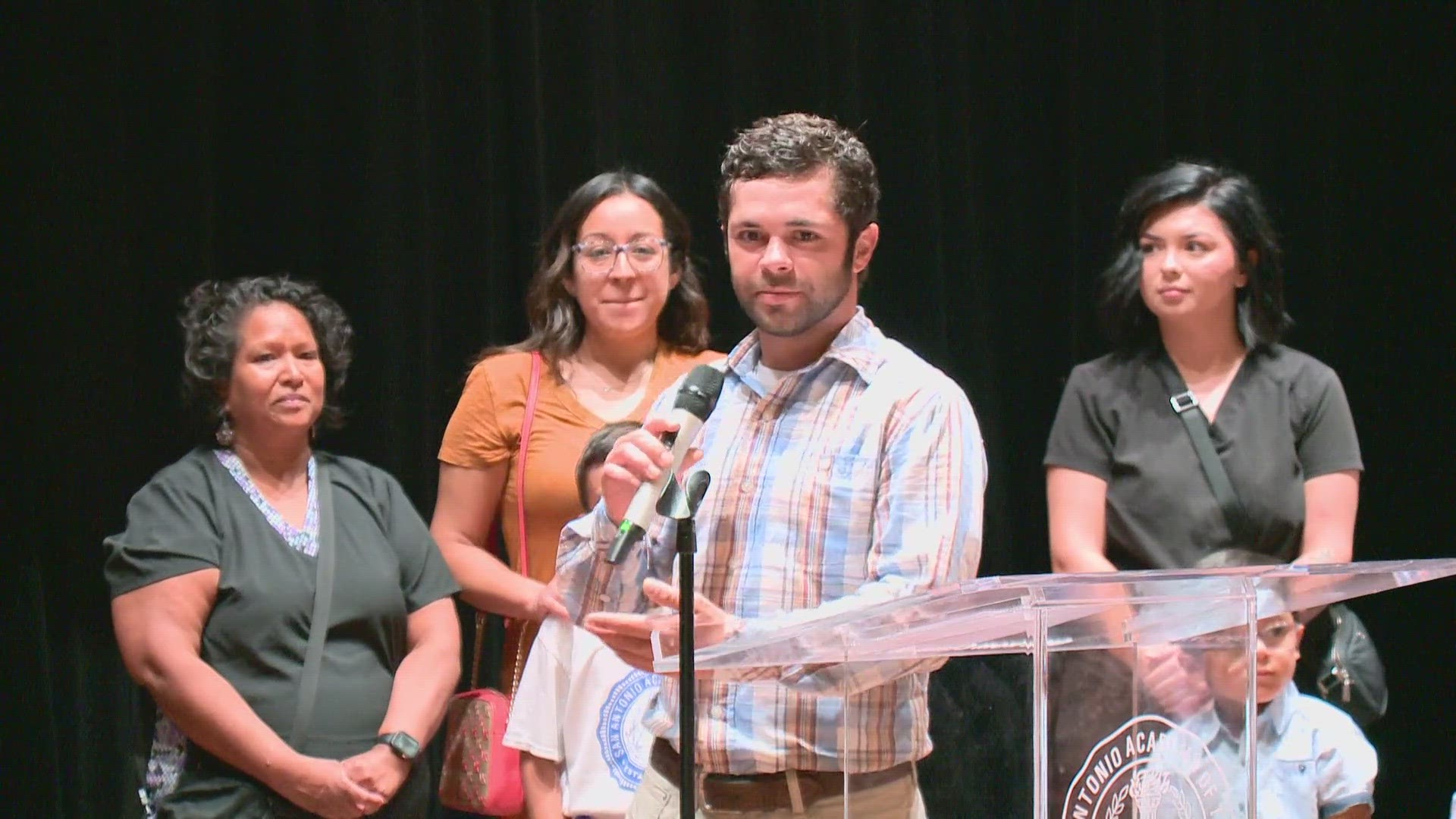 Marco Garza survived the near-drowing and was on hand at the ceremony at the San Antonio Academy to honor the heroic efforts of Sluder and Walker.