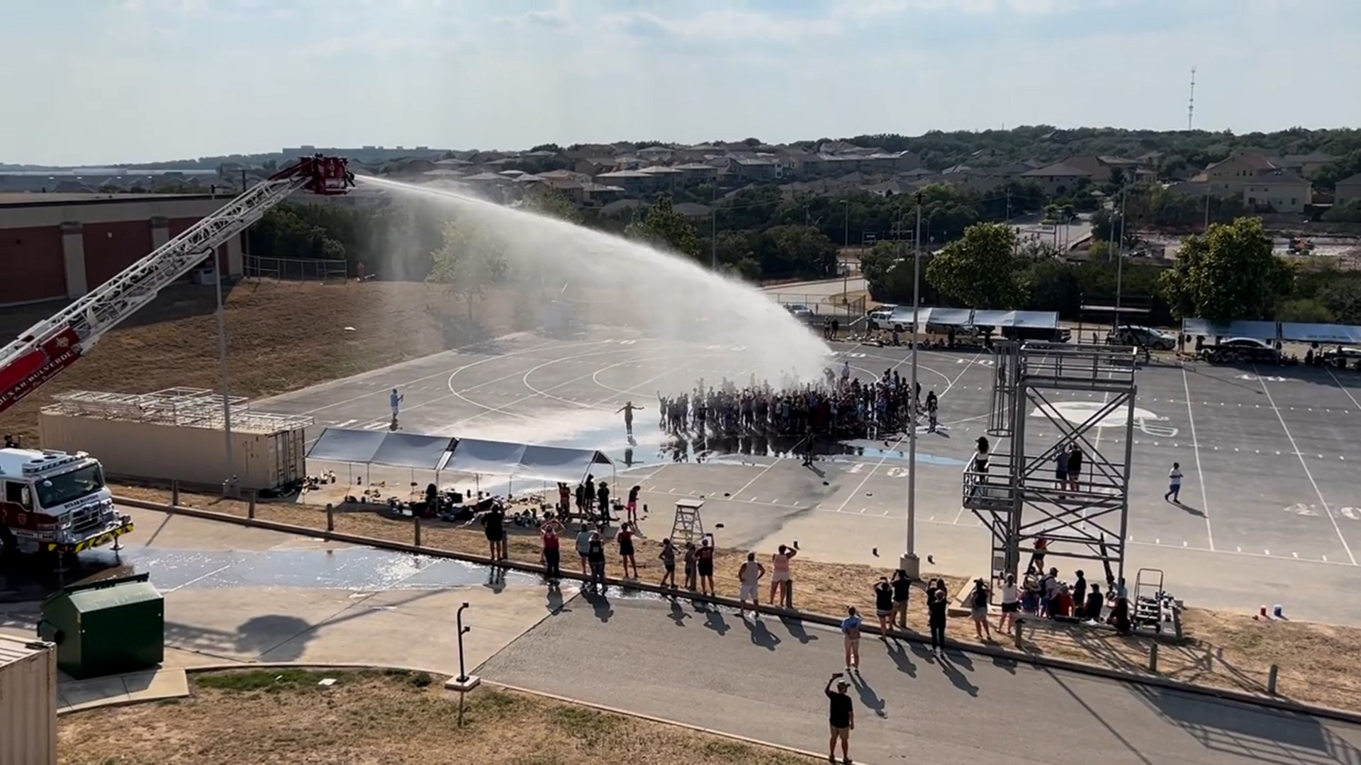 Johnson High School band cools off after Saturday rehearsal