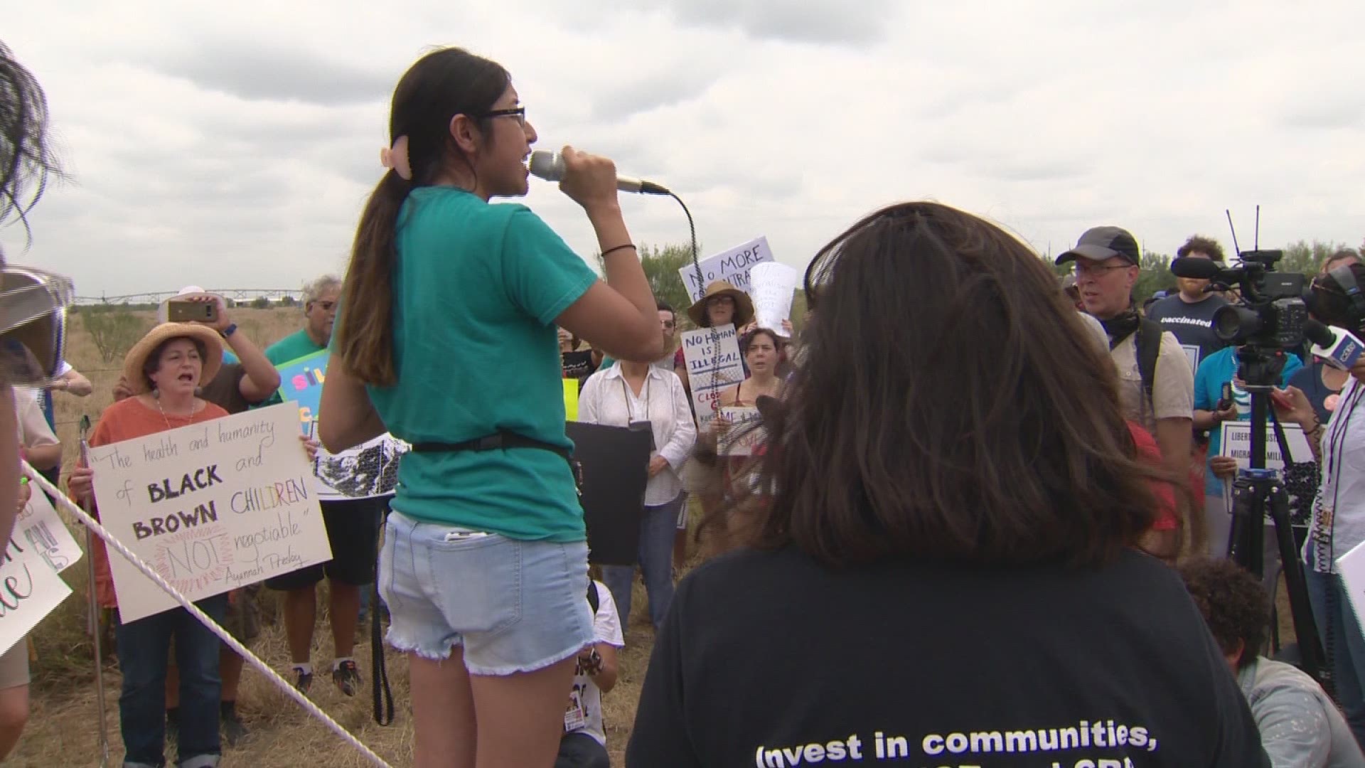Three protesters chanting outside a new emergency shelter in Carrizo Springs for unaccompanied teens were arrested.
