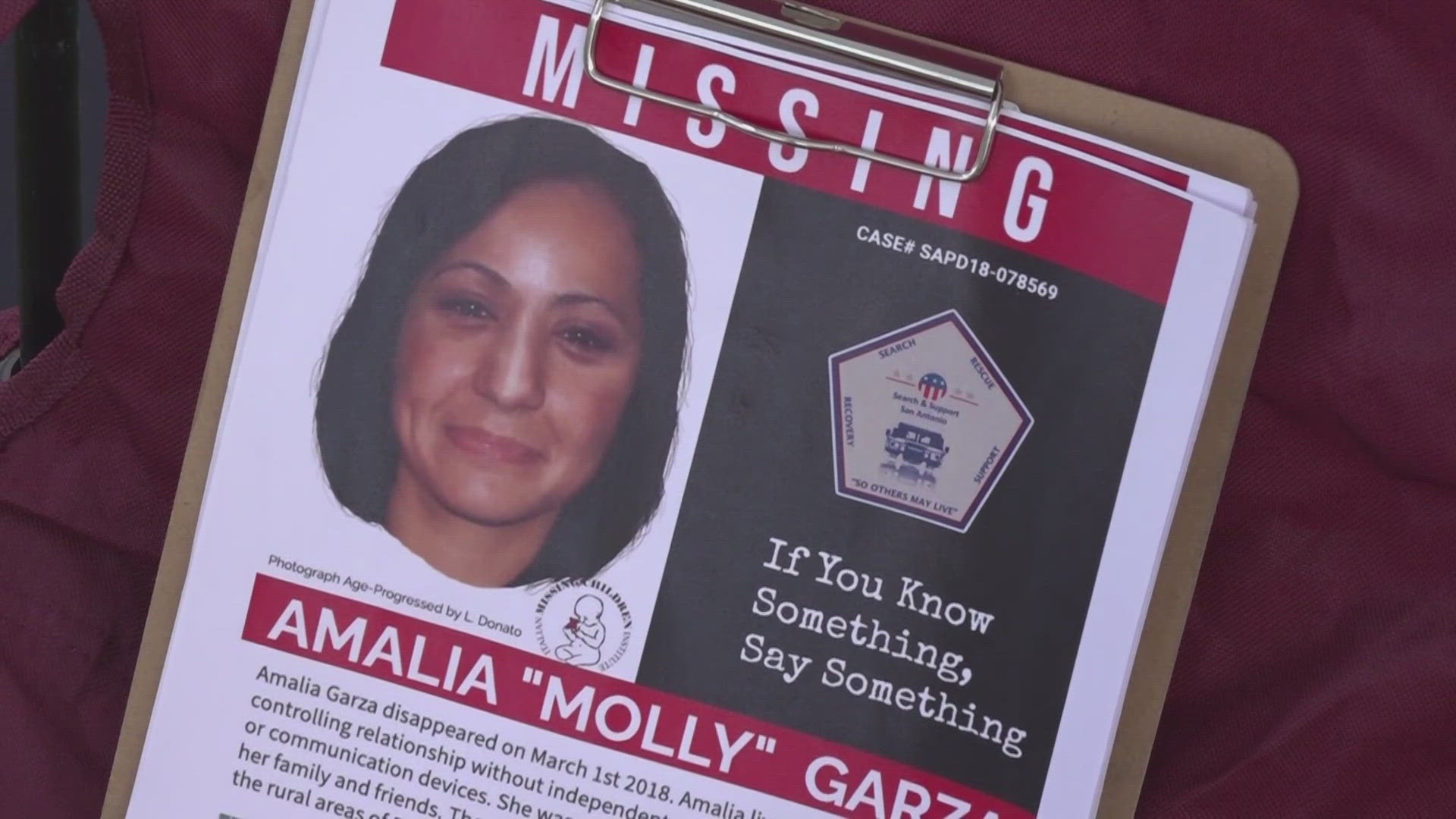 The family gathered at the last known location of Amalia "Molly" Garza on her birthday to hand out flyers.