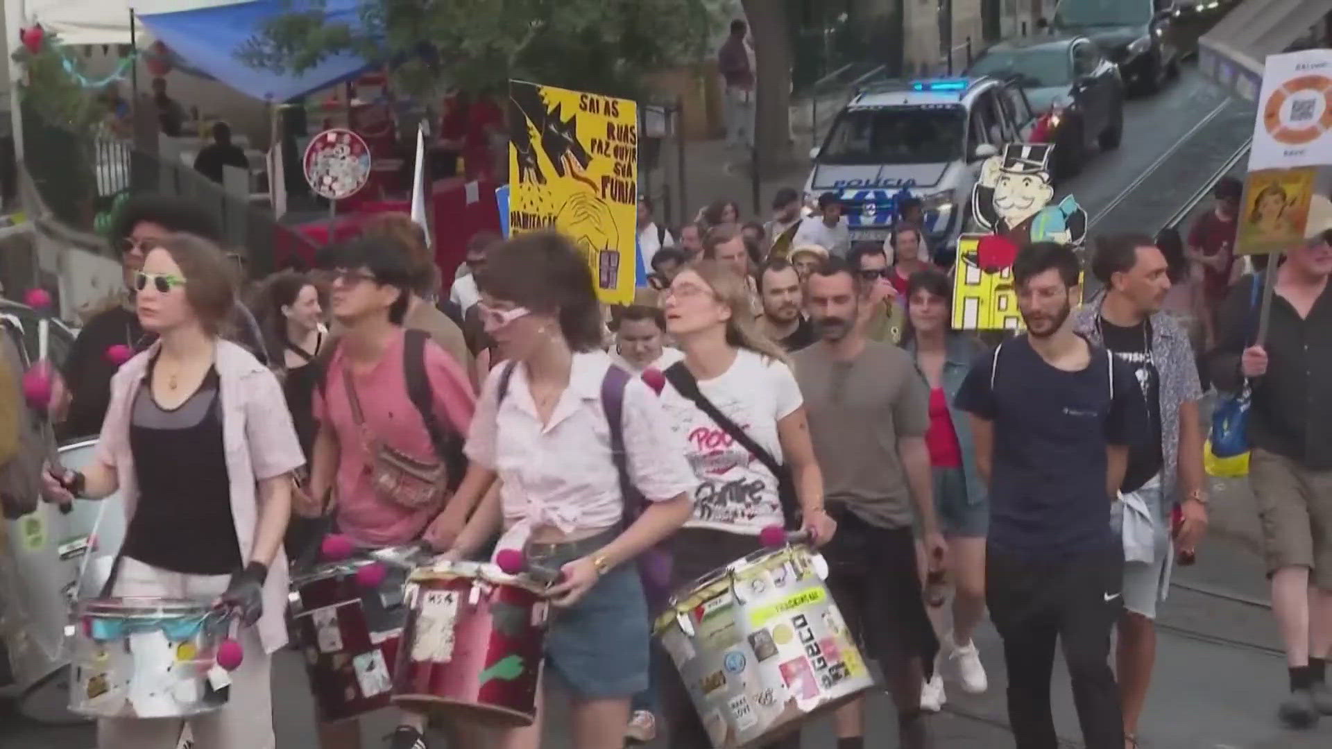 Demonstrators turned water guns on tourists to dampen their travels, while some also set off smoke cannisters.