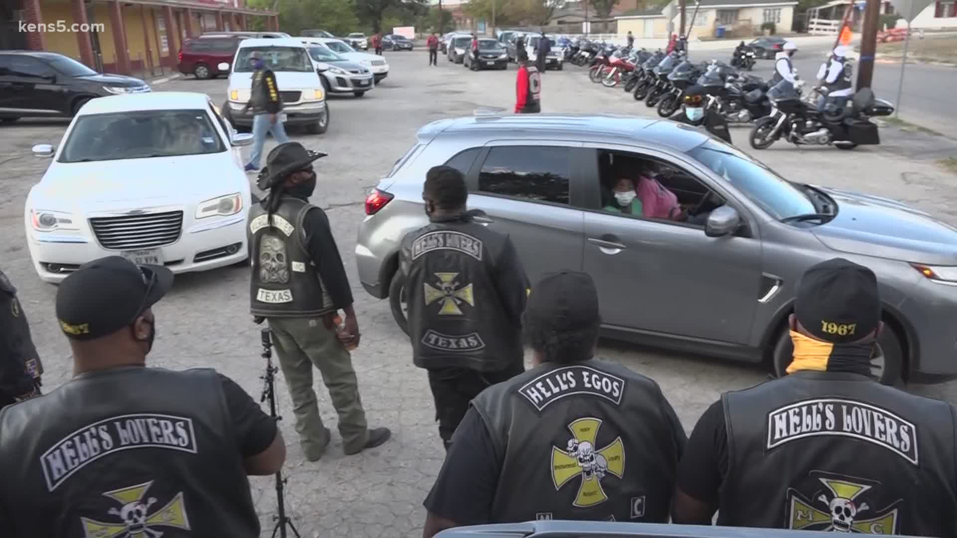 About 20 biker clubs across San Antonio, all predominantly black, have partnered together to pass out 500 Thanksgiving turkeys to families in need drive thru style.
