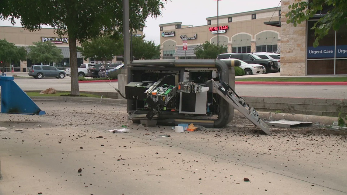 Police search for suspects who destroyed and stole from an ATM