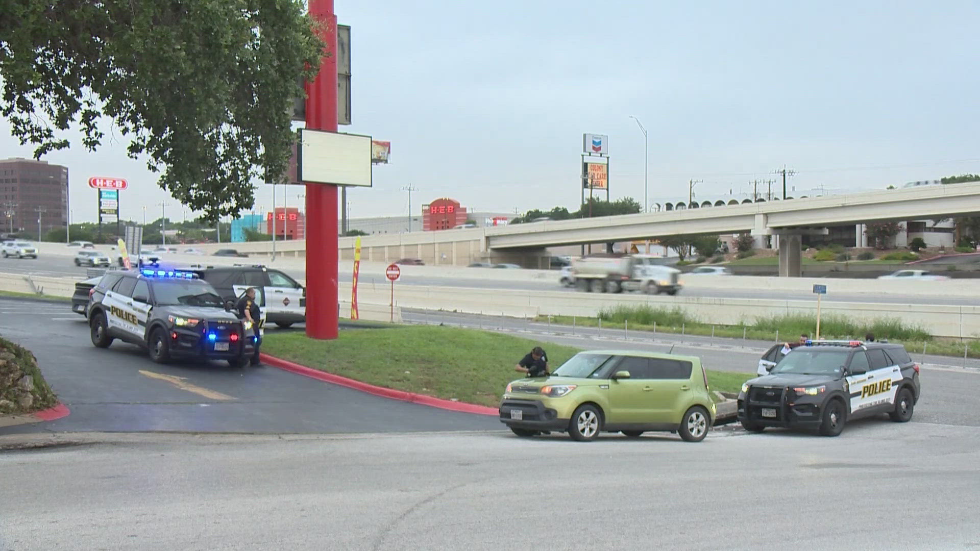 A man in white truck asked the Uber driver to pull over, then that driver fired shots at the Uber driver. 