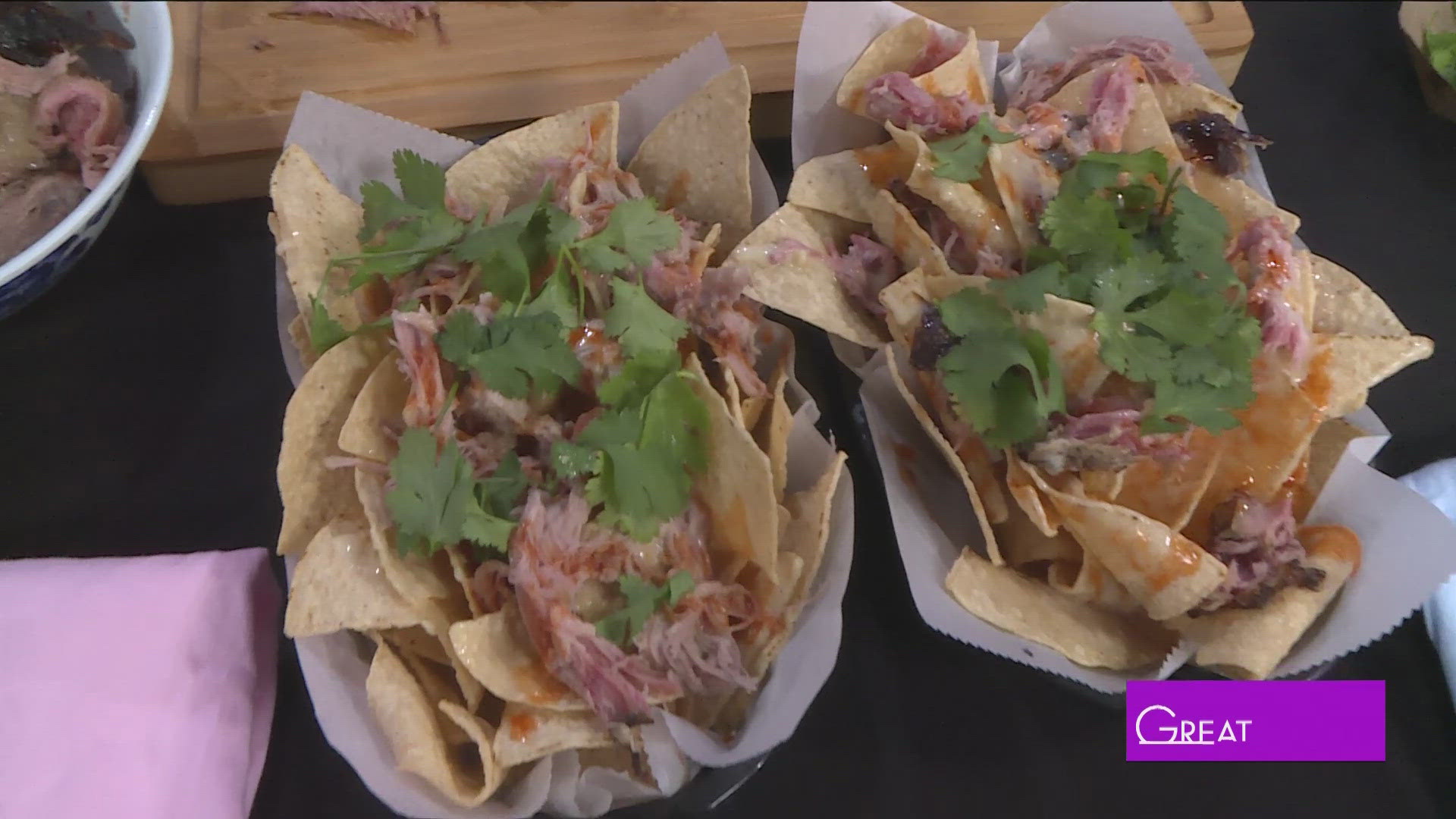 Paul helps make some yummy nachos with Andrew Ho of Curry Boys BBQ.