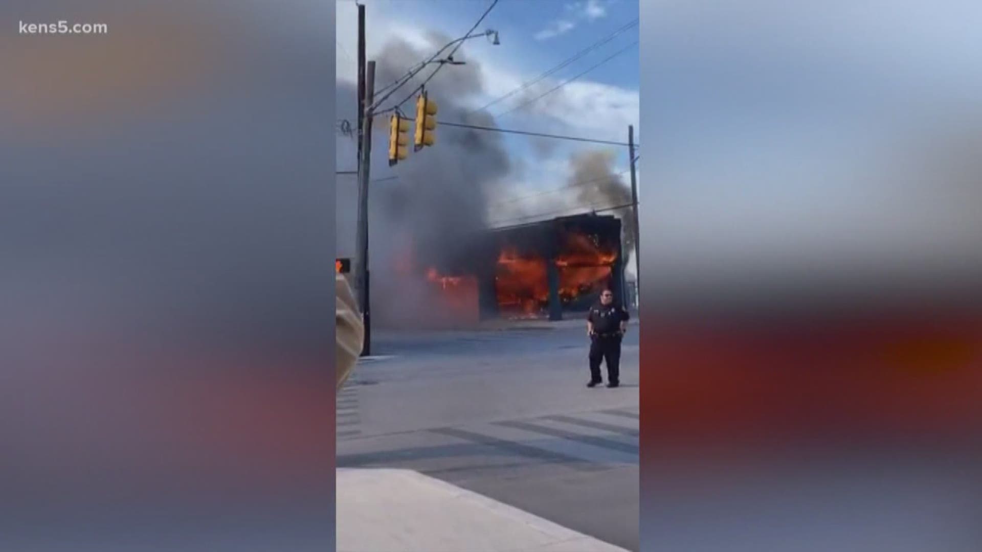 A massive fire tears through a business just south of downtown Friday morning.