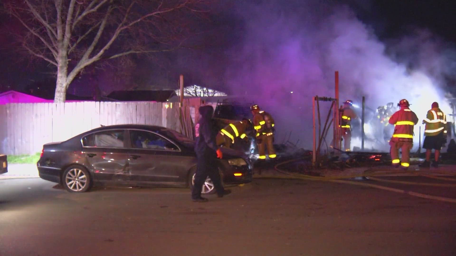 Crews arrived to find at least two vehicles on fire, as well as a shed.