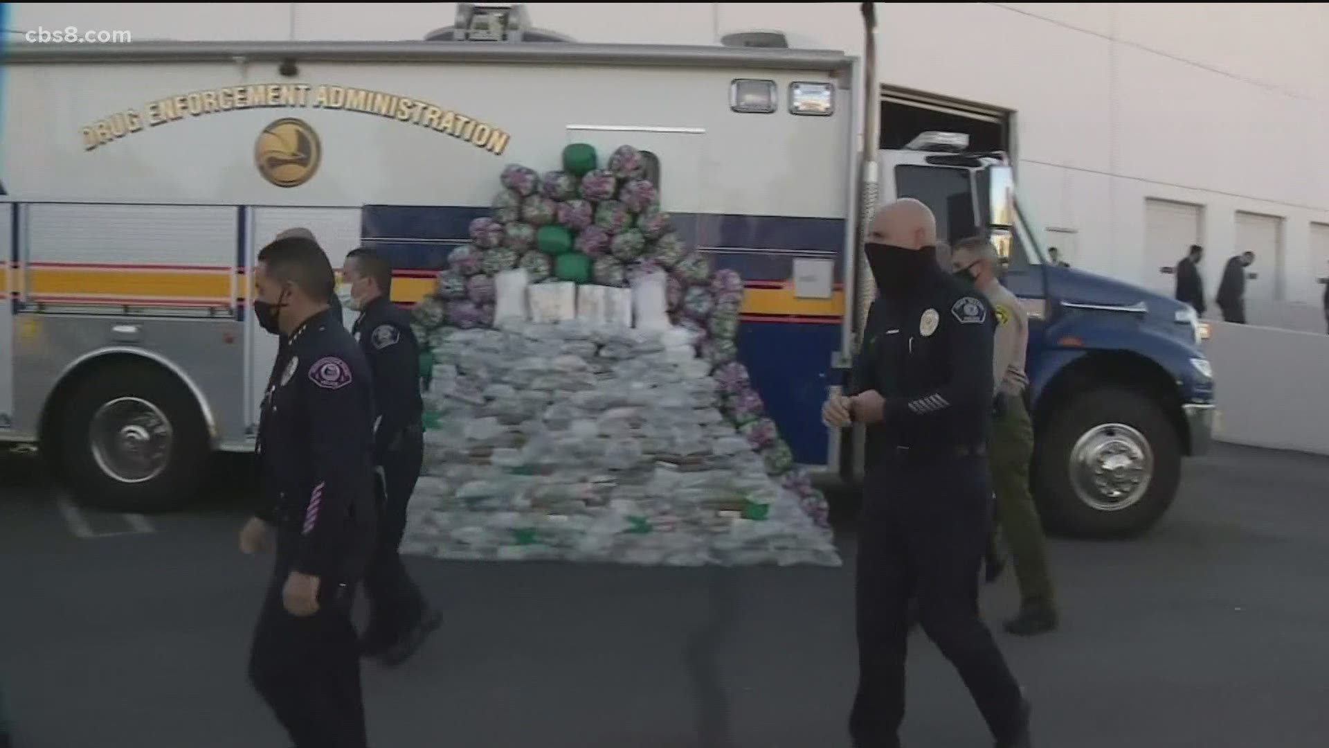 Federal agents displayed a 10-foot high pile of the confiscated drug representing a haul of more than 2,200 pounds seized at stash houses in Riverside County.