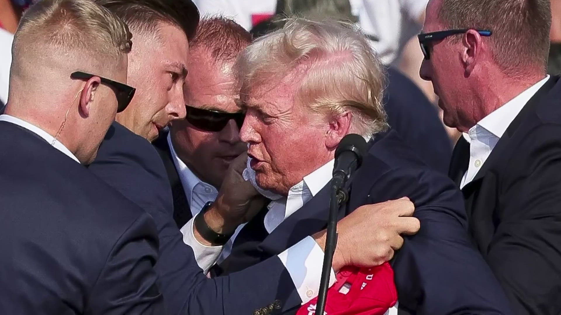 Bangs started ringing through the crowd during Donald Trump's last rally before the Republican National Convention opens Monday.