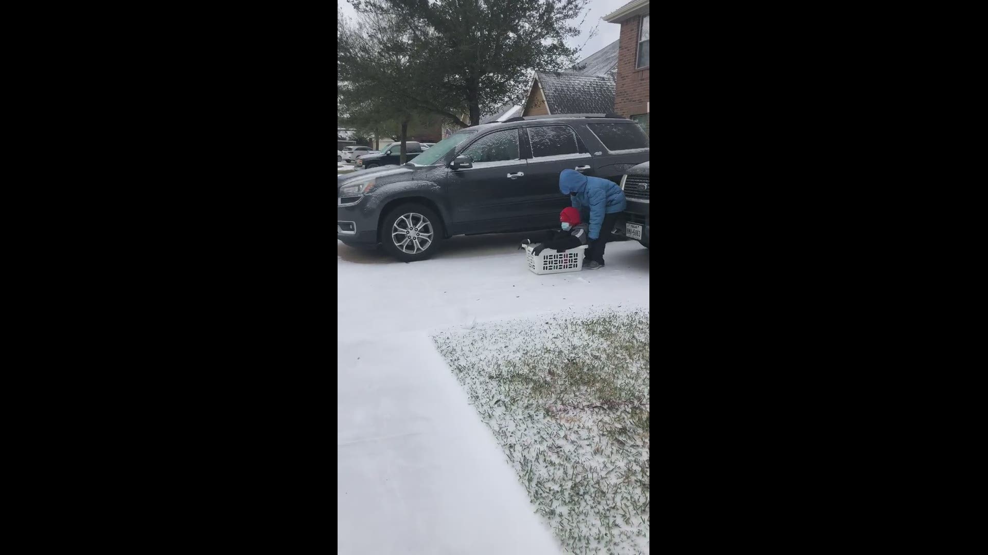 No sled? No problem! Family in Deer Park uses laundry basket for sledding.
Credit: Alicia Green