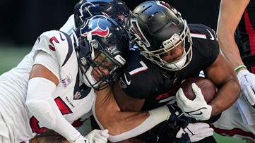 JJ Watt with Baby Son at Houston Texans Ring of Honor Induction