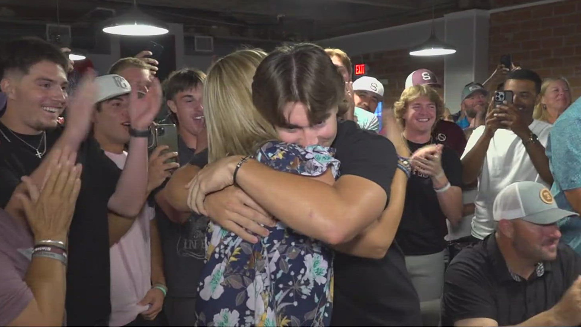 More than 100 family and friends came to Back Street Restaurant in Sinton to watch the draft with Mitchell. His mom said today's celebration was a culmination of ev