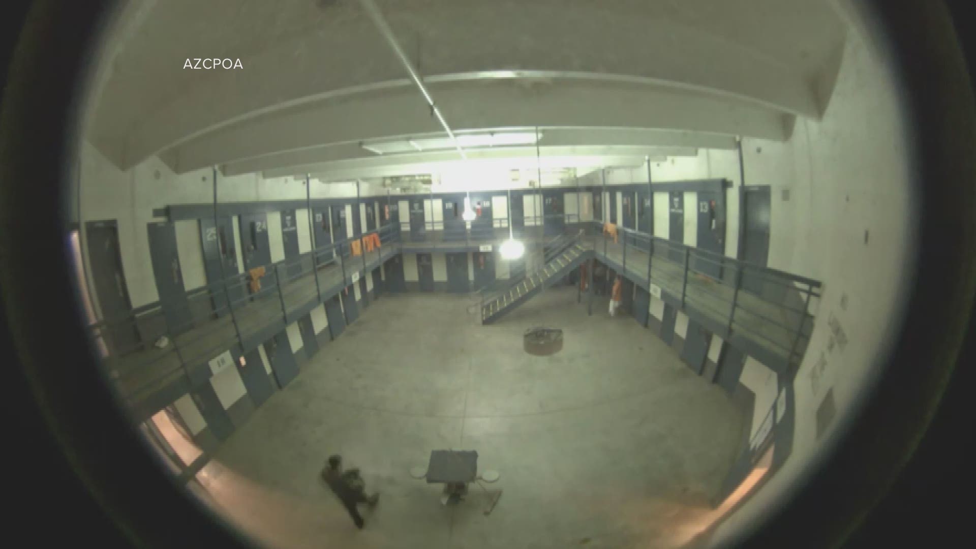In surveillance video released by AZCPOA inmates at Lewis Prison in Buckeye, AZ can be seen attacking two officers. At first, two inmates are seen hitting officers then seven inmates join in. Moments later all inmates disappear out of the frame, only to all rush back into the frame and up the stairs.