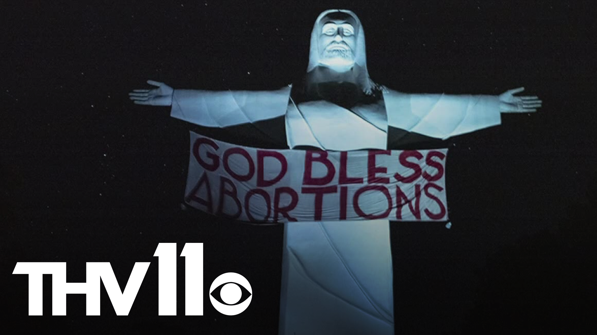The activists placed a 'God Bless Abortions' banner on the monument that sits right outside of Eureka Springs