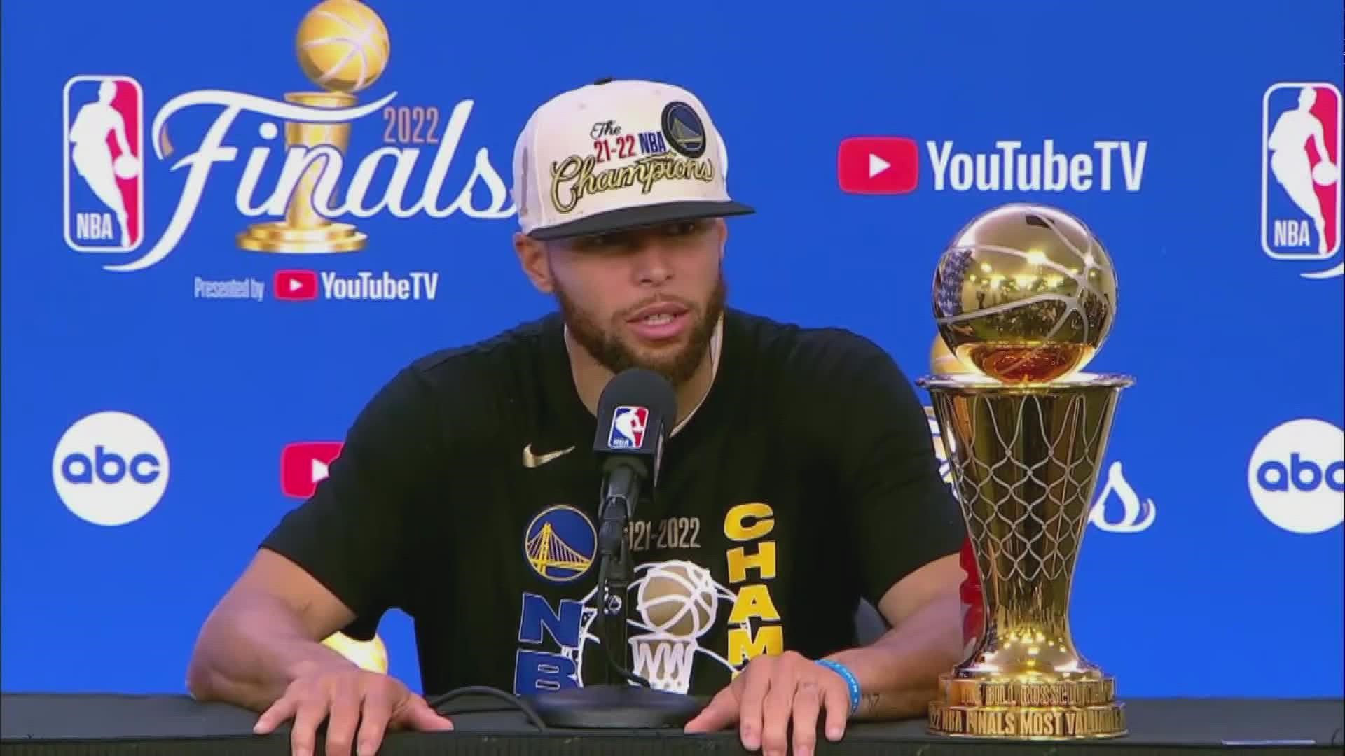 Golden State Warriors' Stephen Curry is sitting down for a brief postgame conference after winning Game 6 of the NBA Finals and clinching the conference.