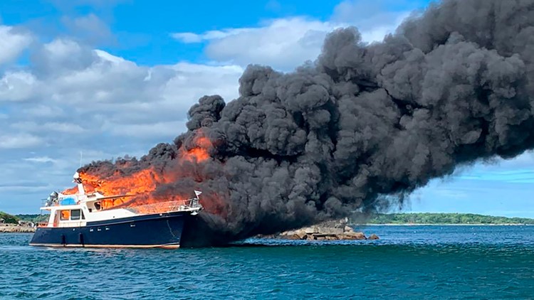 3 people, 2 dogs jump overboard as yacht burns and sinks on Piscataqua River