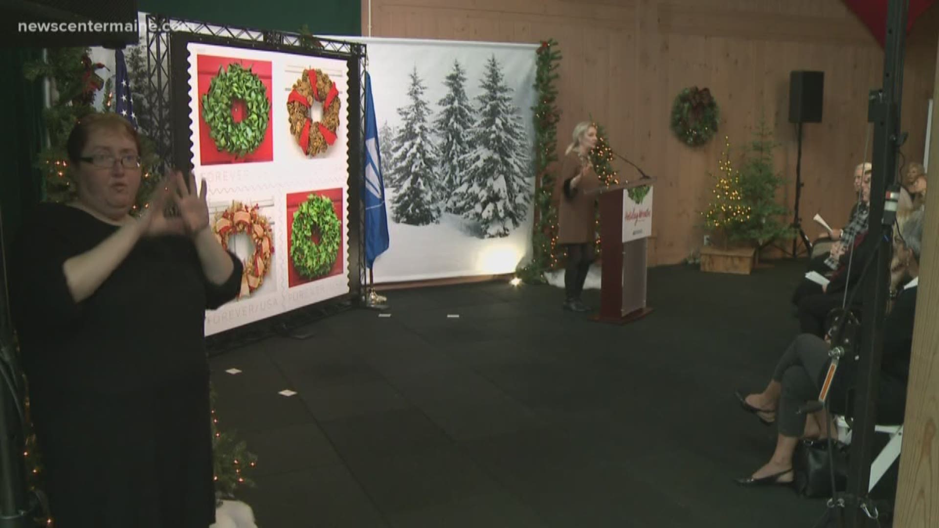 A ceremony to unveil a new set of holiday stamps made L.L. Bean an island of Christmas cheer while the rest of Freeport was still focused on Halloween last Friday.