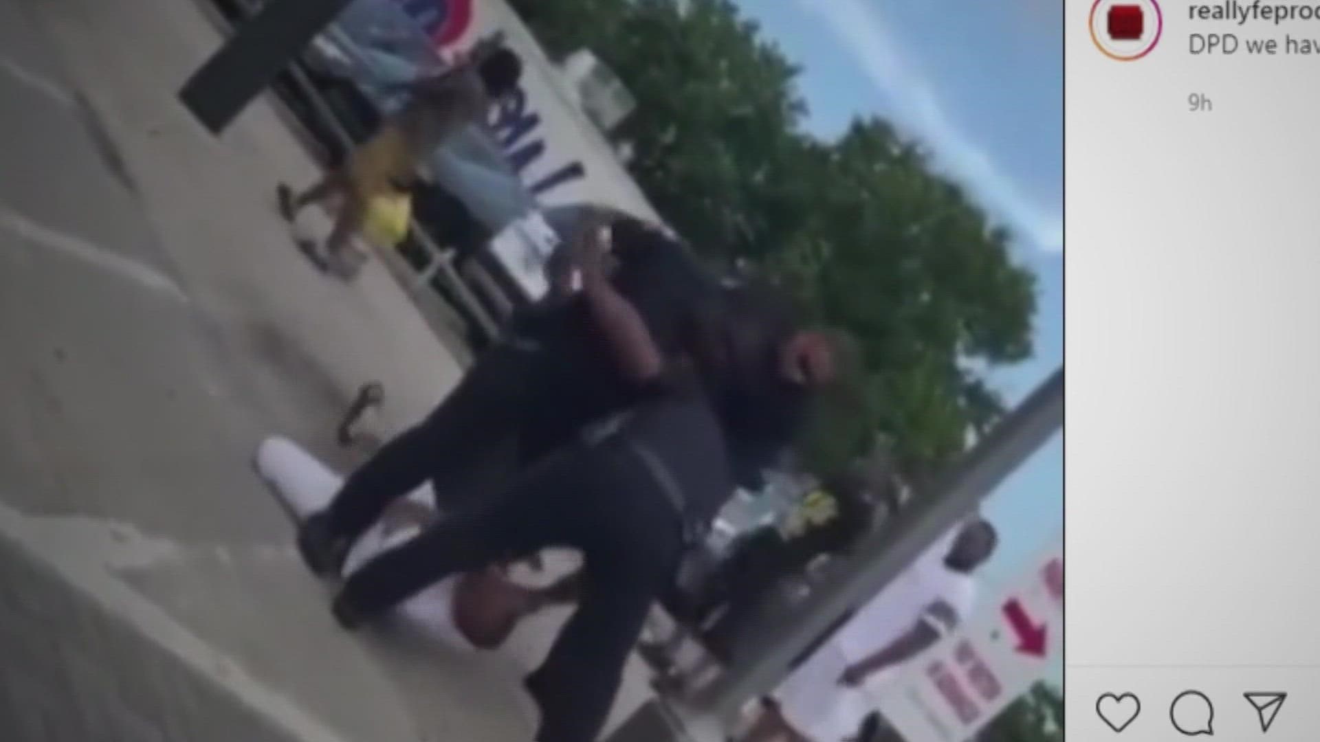 A Dallas police officer was placed on administrative leave after a video circulating on social media shows the officer punching a man several times on the ground.