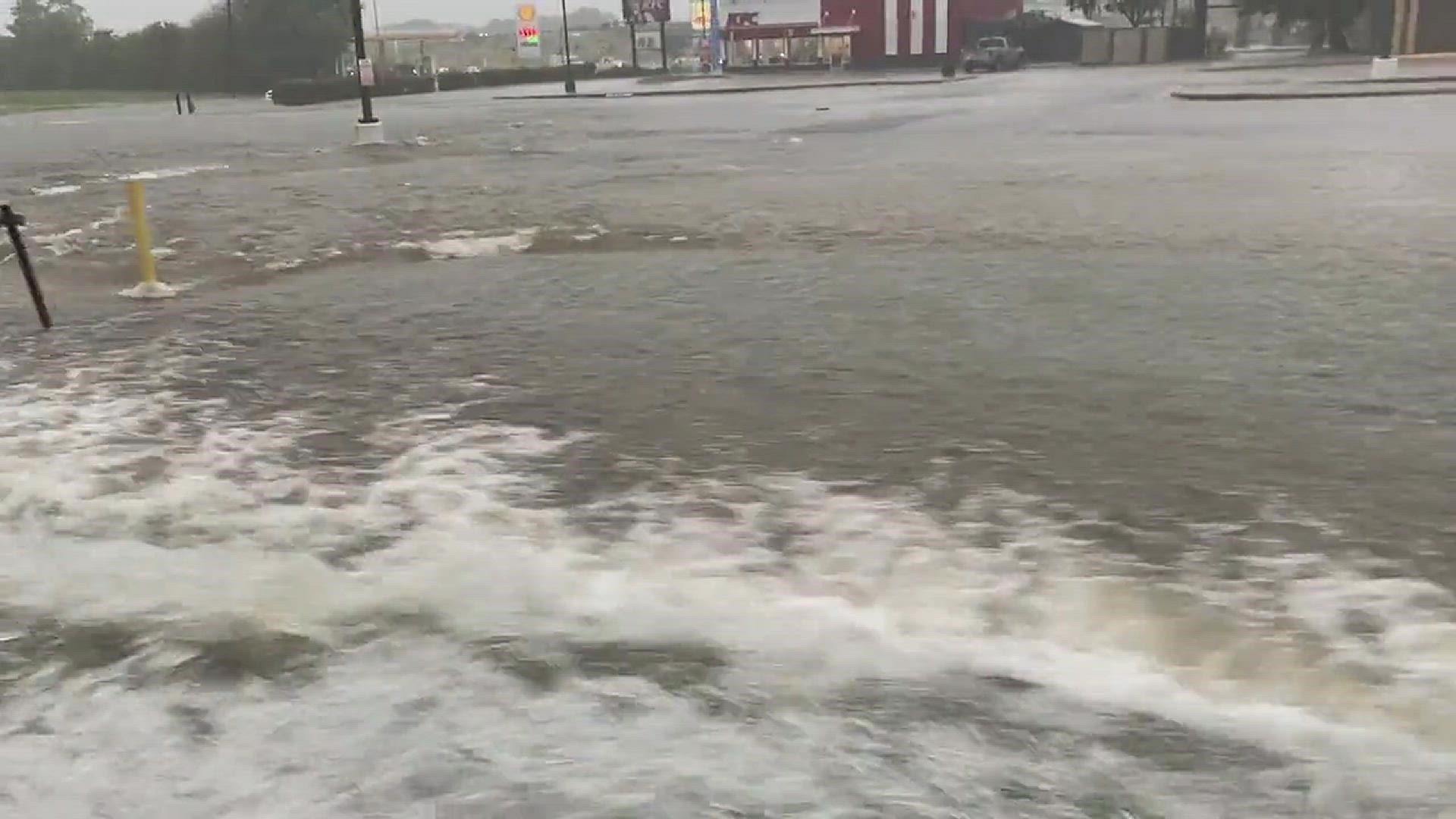 Flooding on roads in Balch Springs, Texas as storms drop several inches of rain Monday morning.