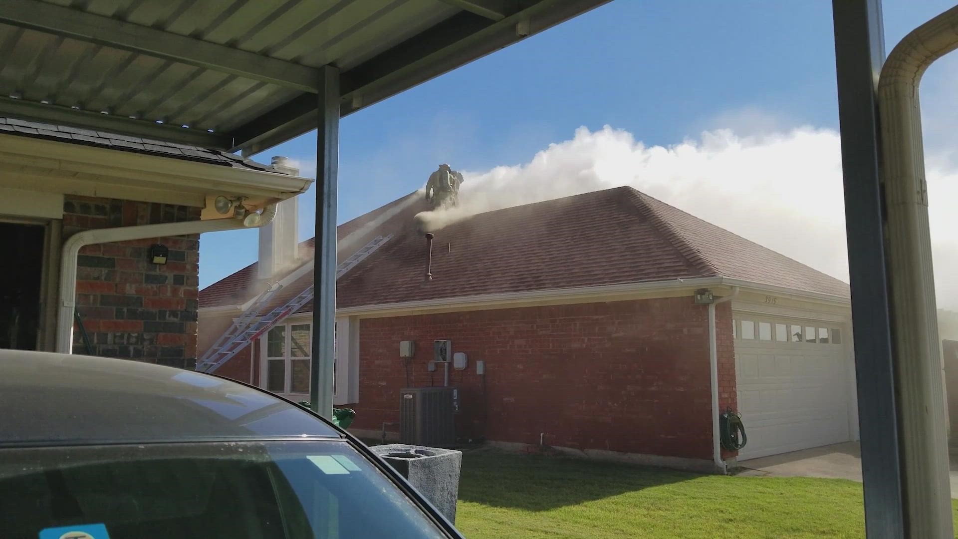 Carrollton police said two people were found with signs of trauma inside the burning home, while another was found with a gunshot wound to the head.